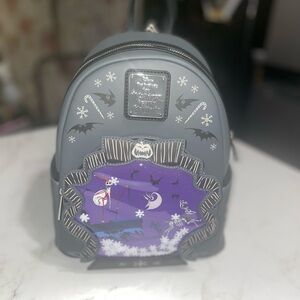 Loungefly sold out NBC Christmas sleigh ride snow globe mini backpack